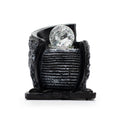 Cette fontaine d’intérieur de table noire effet pierre avec boule cristal apporte une touche zen, élégante et contemporaine à votre décoration. Compacte et décorative, elle est parfaite pour créer une ambiance apaisante dans un salon, un bureau, une chambre ou un espace de méditation.