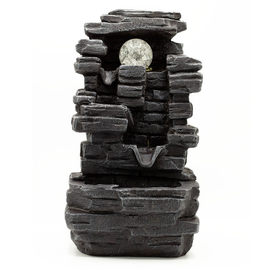 Fontaine d’intérieur effet roche anthracite avec boule cristal, idéale pour une décoration zen et apaisante.