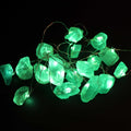 Guirlande lumineuse en jade allumée, parfaite pour créer une ambiance douce, céleste et apaisante.