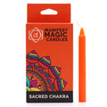 La boîte des Bougies Manifest Magic (lot de 12) - Orange - Chakra sacré, contenant une bougie orange, parfaite pour des pratiques spirituelles et pour apporter passion et sérénité à vos moments de méditation.