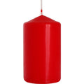 Bougie Biplante Élégante 60x100mm - rouge présentée seule sur un fond blanc, mettant en valeur sa forme classique.