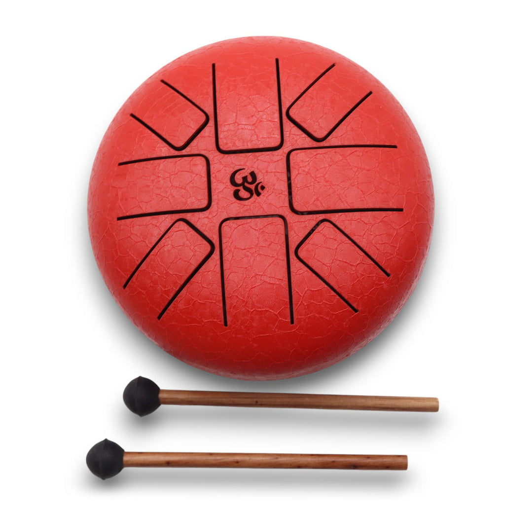 Steel Tongue Happy Drum Om rouge – 16 cm avec baguettes, un tambour spirituel idéal pour la méditation, relaxation et sonothérapie. Ce happy drum est un instrument intuitif qui invite à l'expression créative et s'intègre parfaitement dans tout espace zen.